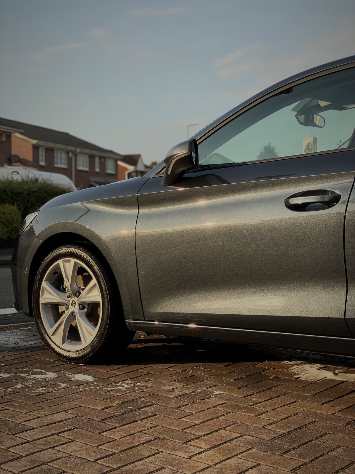 Gleaming grey paintwork in evening light after ARDEN Detailing
